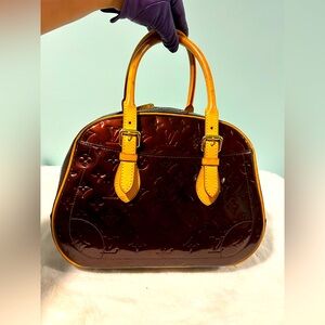 Louis Vuitton Amarante Vernis Summit Drive in Excellent condition.